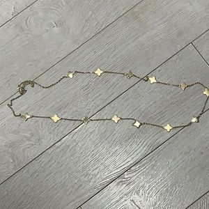 Long gold clover necklace
